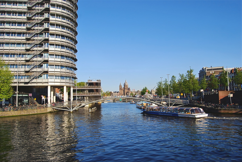 27 - The Zilveren Toren (Silver Tower), a modern round office building located near the Amsterdam Centraal station